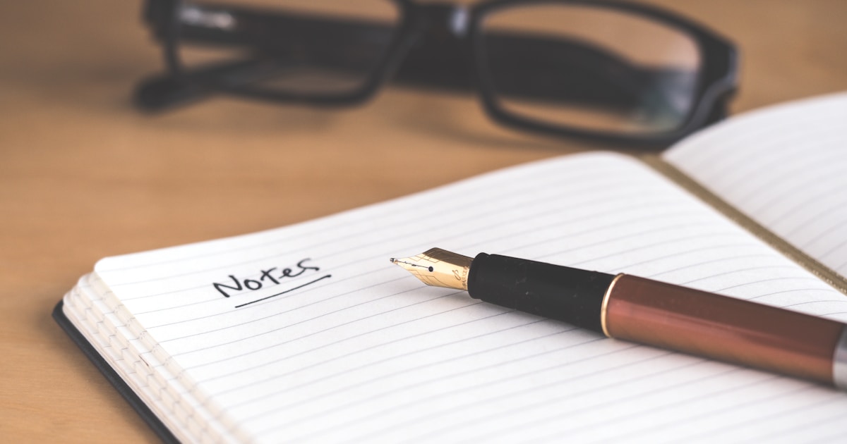 Remote worker tracking time with productivity tools and planner